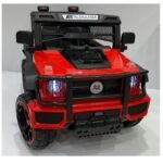 القلاف_للدراجات_النارية_ سيارة أطفال كهربائية دفع رباعي سبيد - لون أحمر رياضي مع عجلات كبيرة وأنوار أمامية وشبك أسود وعبارة "الملحم" على السقف، رقم الموديل CB522-293. _دراجة_نارية